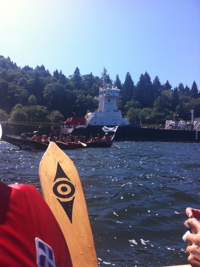 Kinder Morgan in the background. Tsleil Waututh paddle in the foreground.